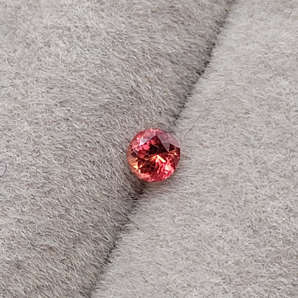 0.20 CT Natural Padparadscha Sapphire - Unheated_grey_background