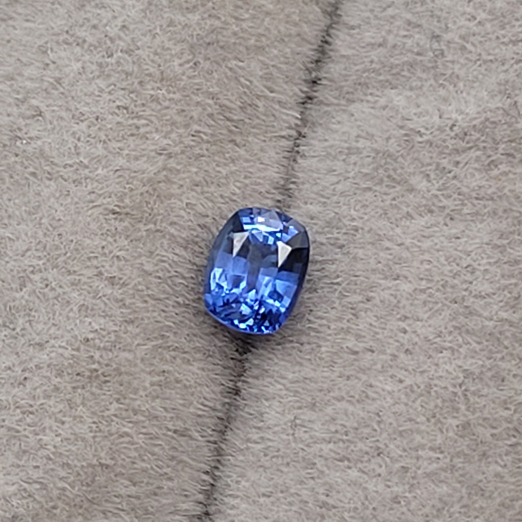 0.63 CT Natural Blue Sapphire - Unheated_cushion_grey_background