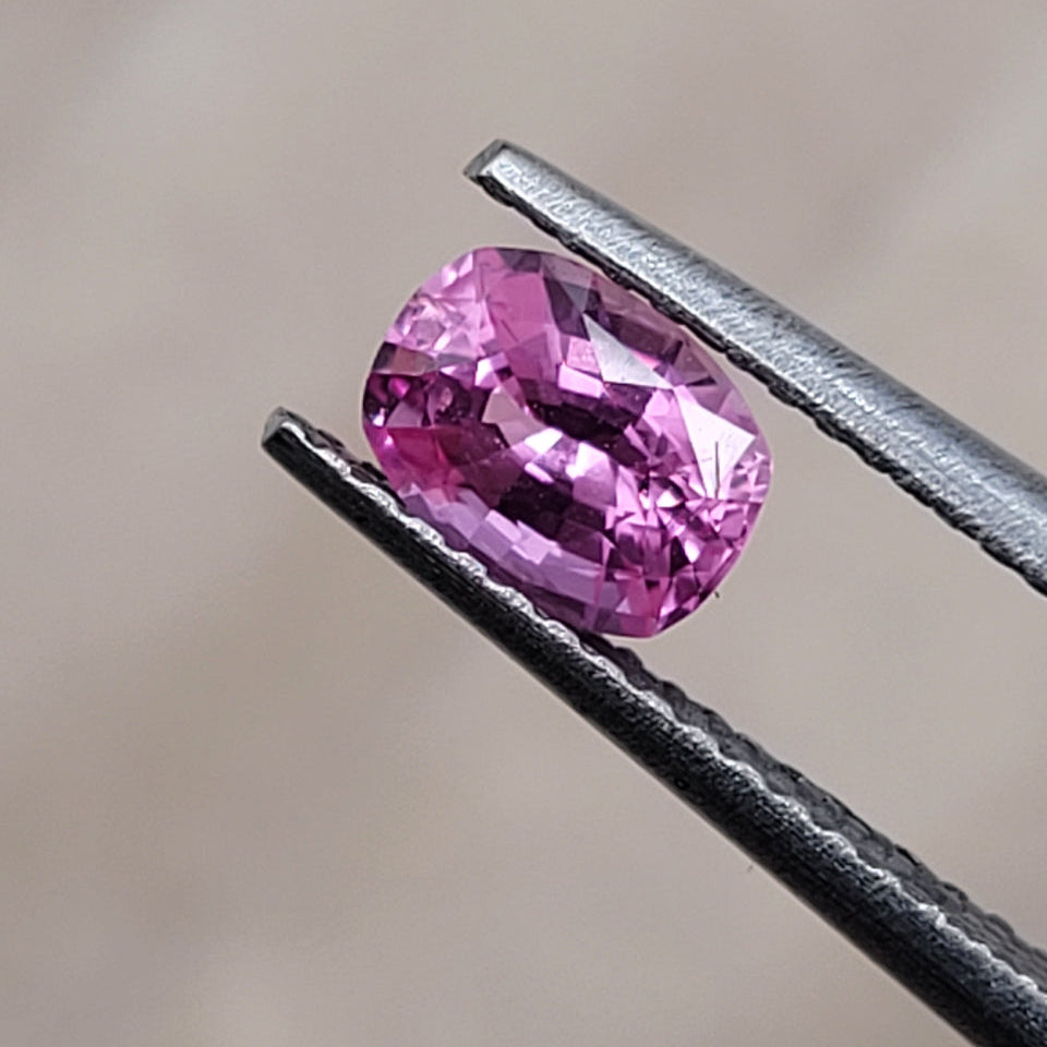0.70 CT Natural Pink Sapphire - Unheated_heldby_tweezer