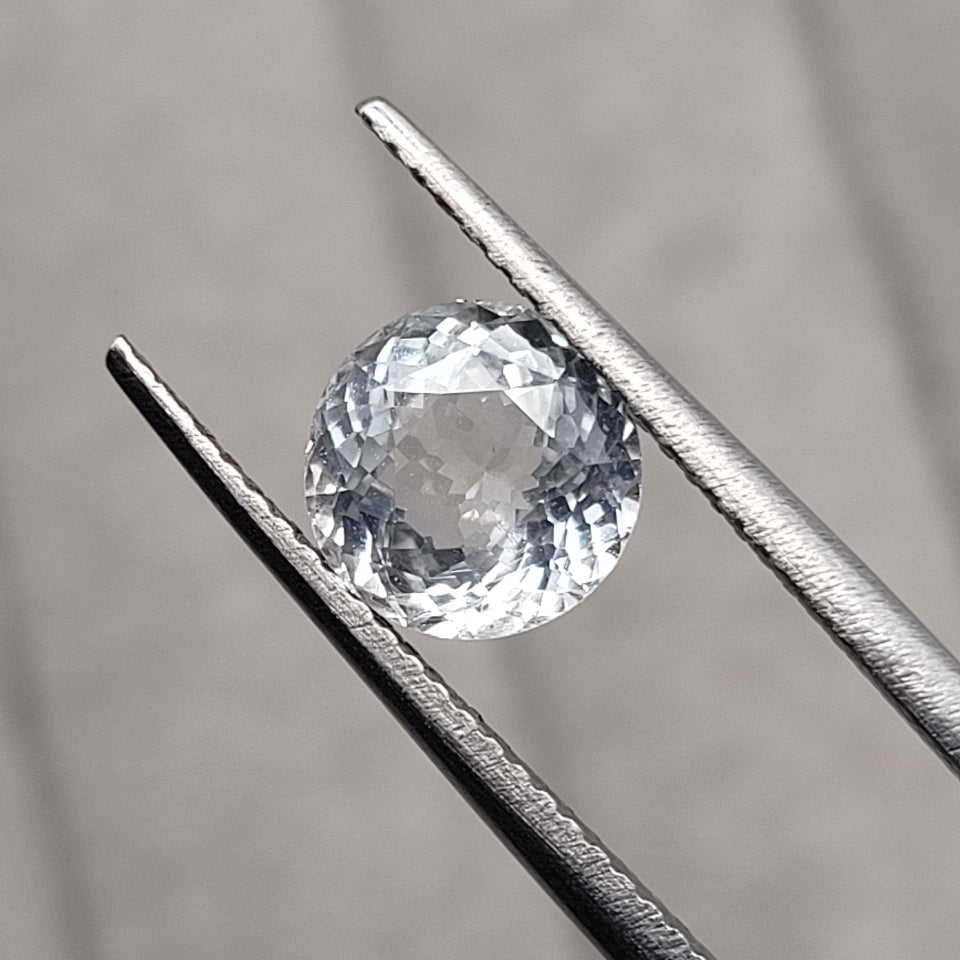 2.08 CT Natural White Sapphire - Heated_heldby_tweezer