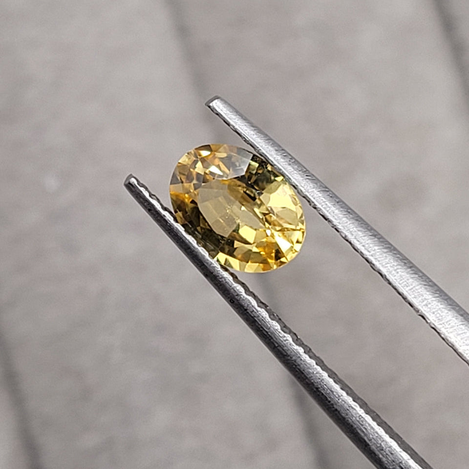 2.25 CT Natural Yellow Sapphire Pair - Heated_heldby_tweezer1