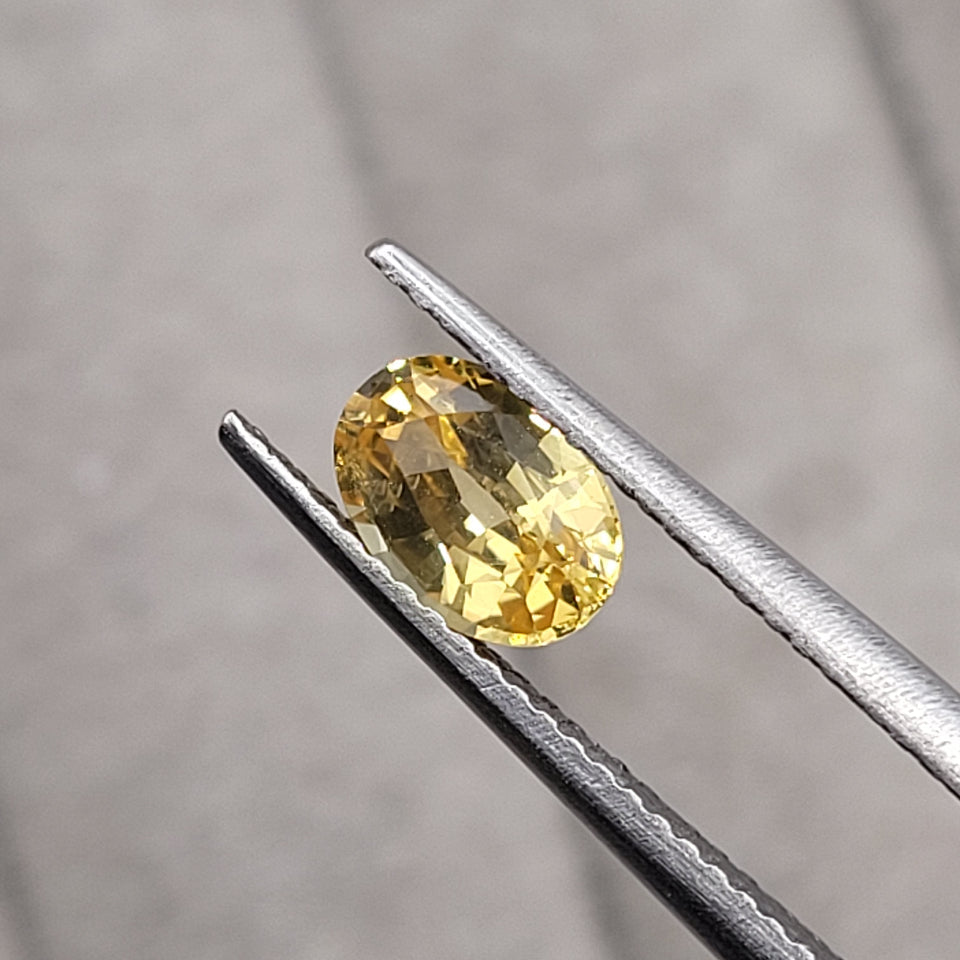 2.25 CT Natural Yellow Sapphire Pair - Heated_heldby_tweezer