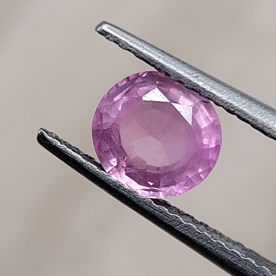 1.25 CT Natural Pink Sapphire - Unheated_heldby_tweezer